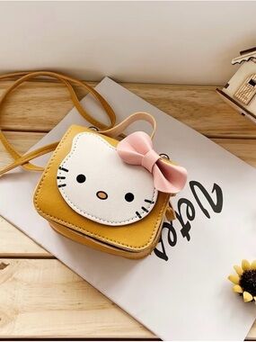Yellow Hello Kitty Crossbody Bag with Pink Bow